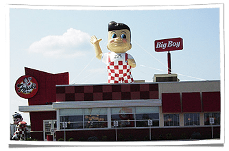 Frisch's Inflatable Big Boy Mascot Displayed on Restaurant Rooftop